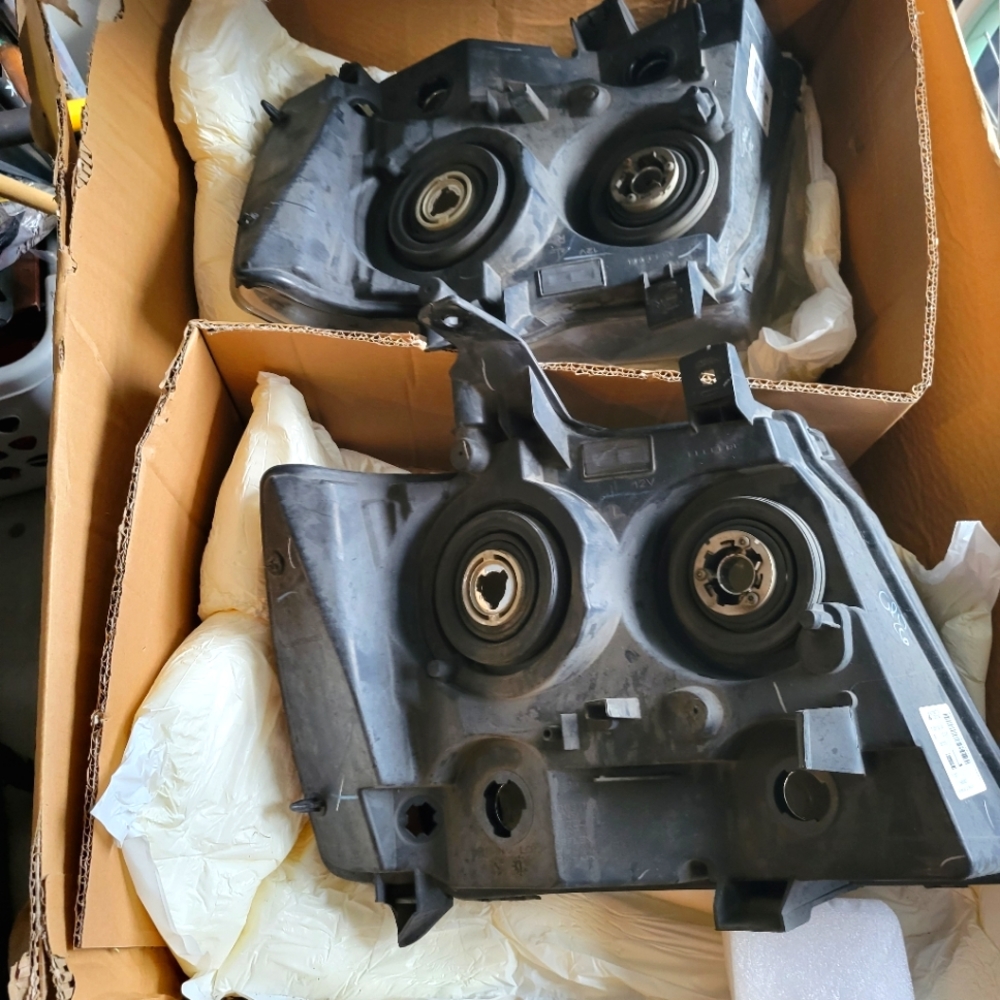 (2) Headlight Cover Used (AS IS)